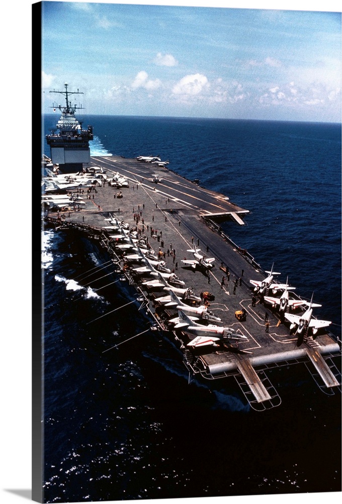 Gulf of Tonkin: Nuclear powered carrier USS Enterprise cruises off shores of Vietnam. A-4 Skyhawk bombers are positioned o...