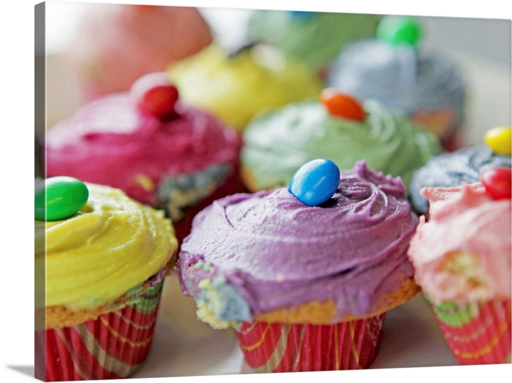 Various colorful homemade cupcakes.