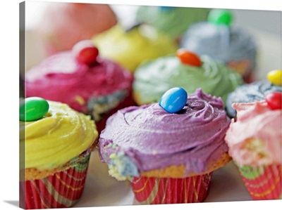 Various colorful homemade cupcakes.
