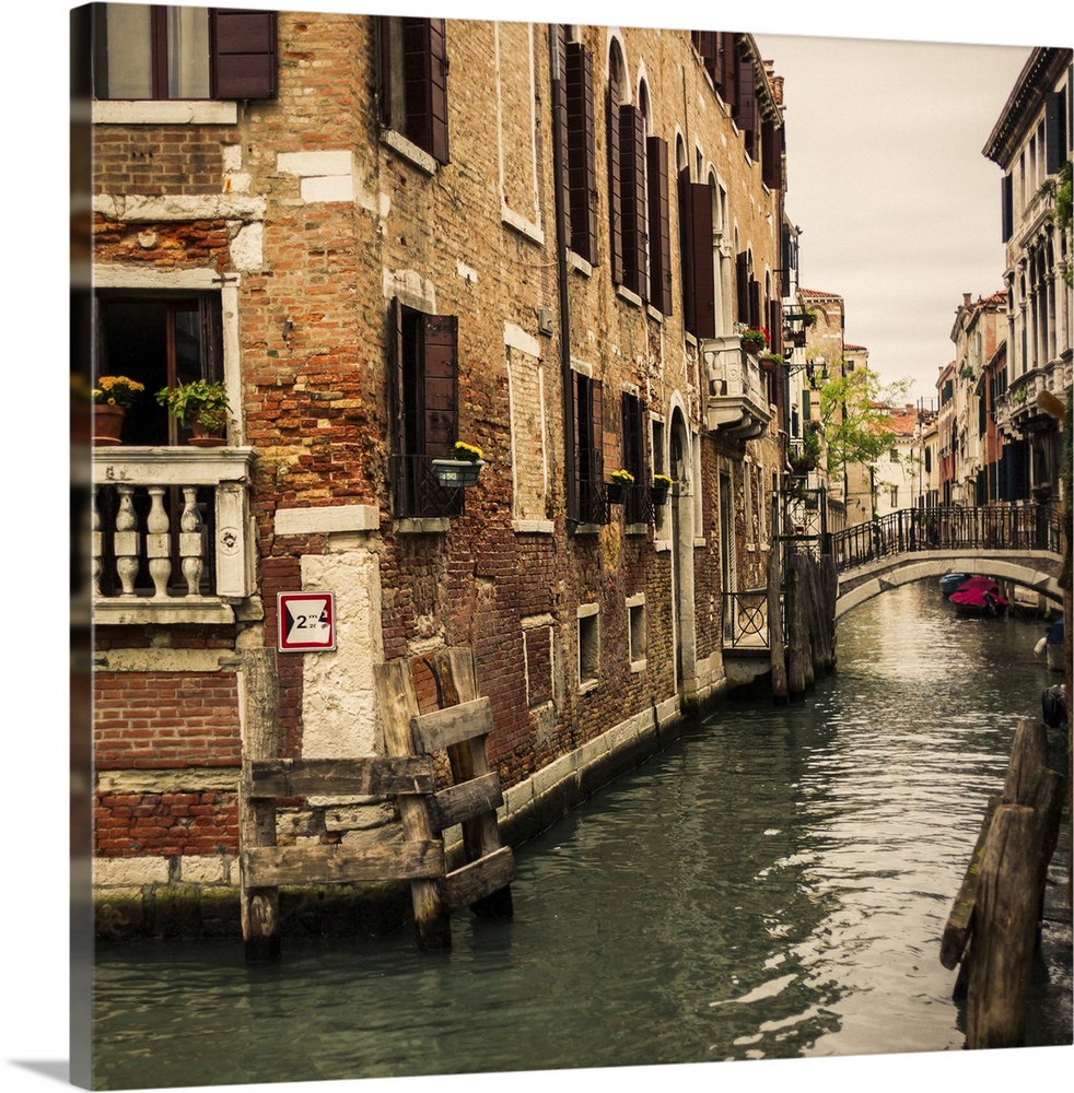 Brick structures on small Venice canal.