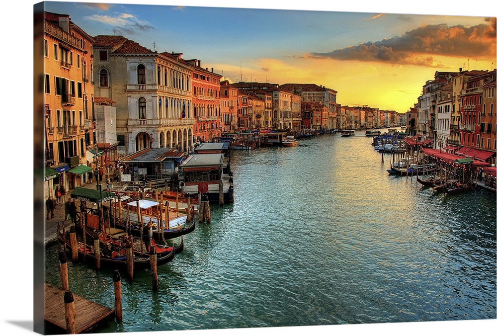 From the Rialto Bridge, looking down the Grand Canal showing the stunning color's of  sunset.