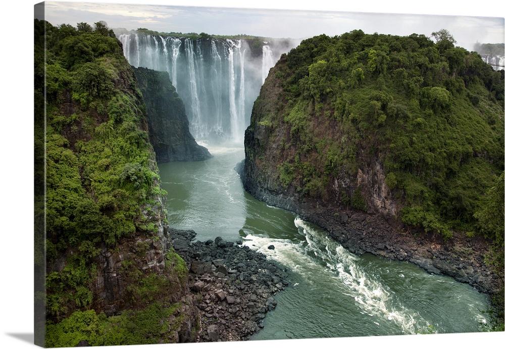 Victoria Falls is a waterfall of 355ft (109m) on the Zambezi River on the border of Zambia and Zimbabwe in Southern Africa.