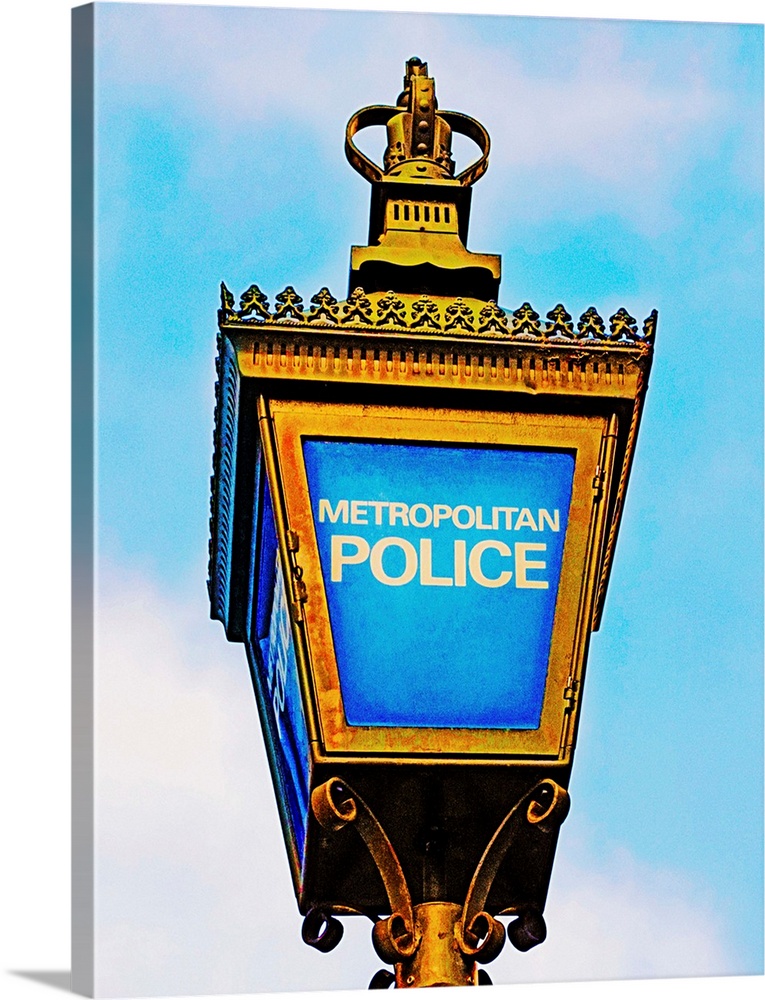 Old Victorian blue police lamp in Central London, UK.