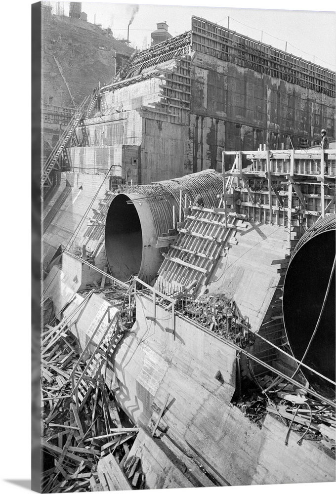 Above is a view, taken from the foundation of the power house, of construction at Norris Dam, which was being built by the...