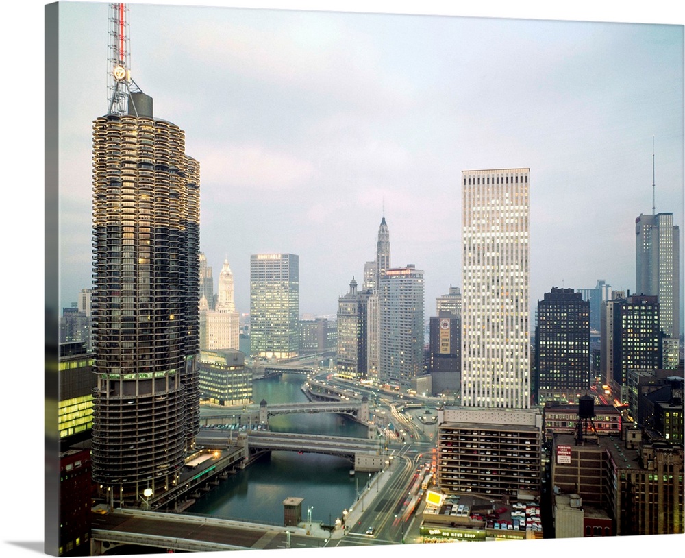 Looking east with Chicago River in pictures, buildings are (left foreground, clockwise): Marine City; Chicago Sun-Times an...