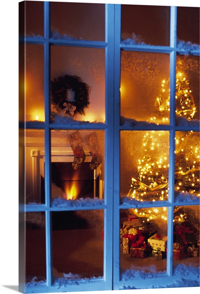 View through window of home decorated for Christmas