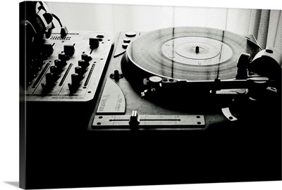 Vinyl record spinning on record player.