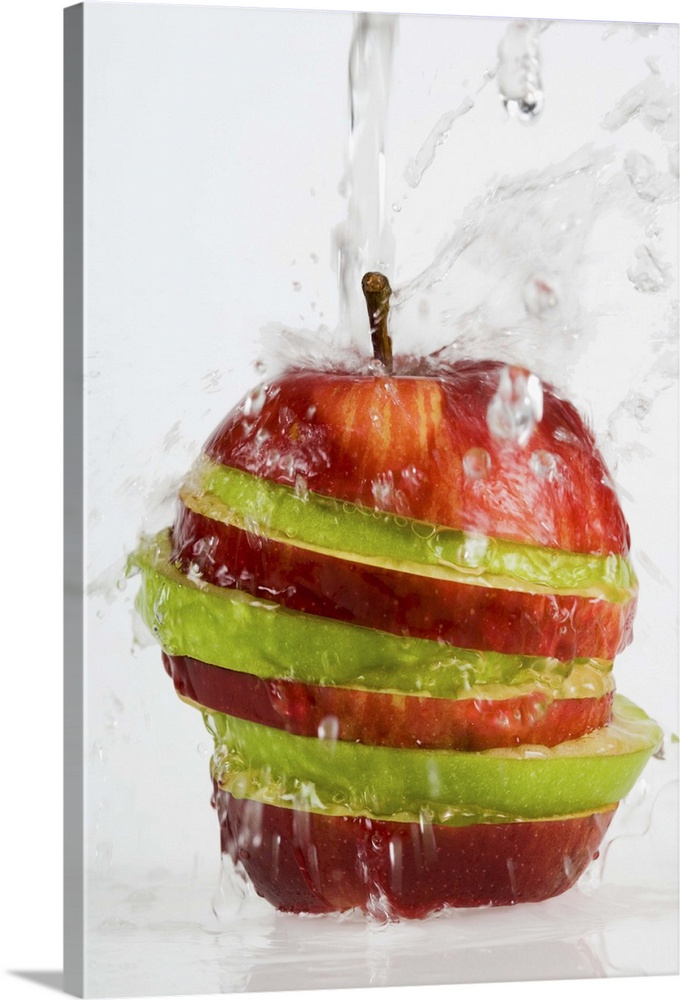 Water pouring on apple