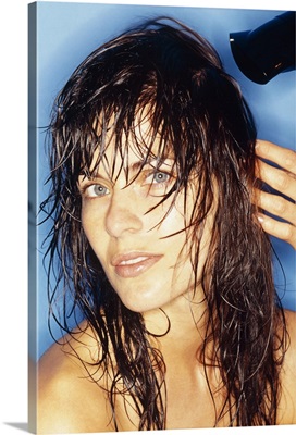 Woman having hair dried