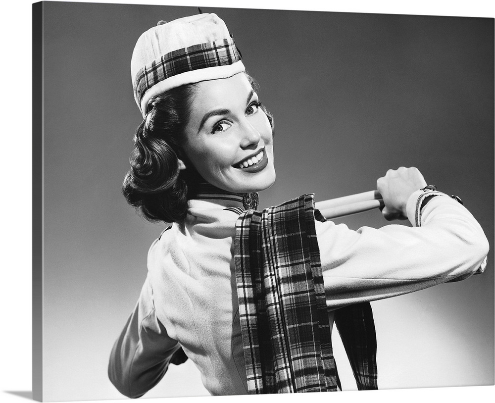 Woman wearing glengarry cap and tartan