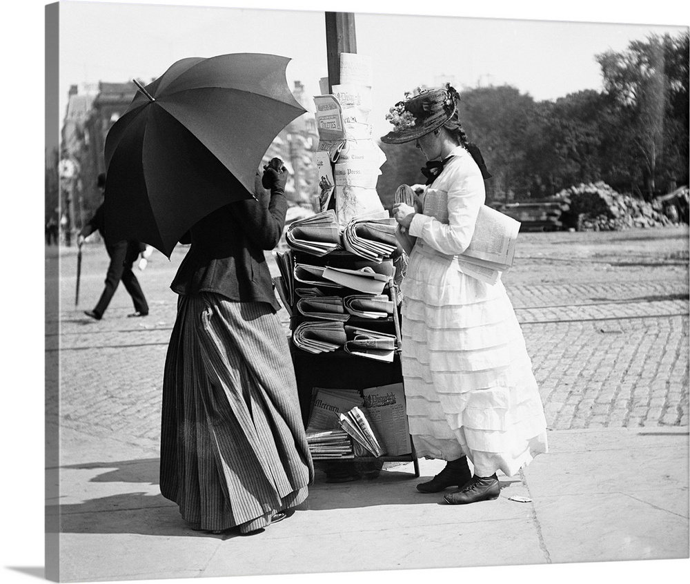 Women selling newspapers at 23rd Street and 5th Avenue, New York City.