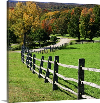 Wooden fence along rural pasture