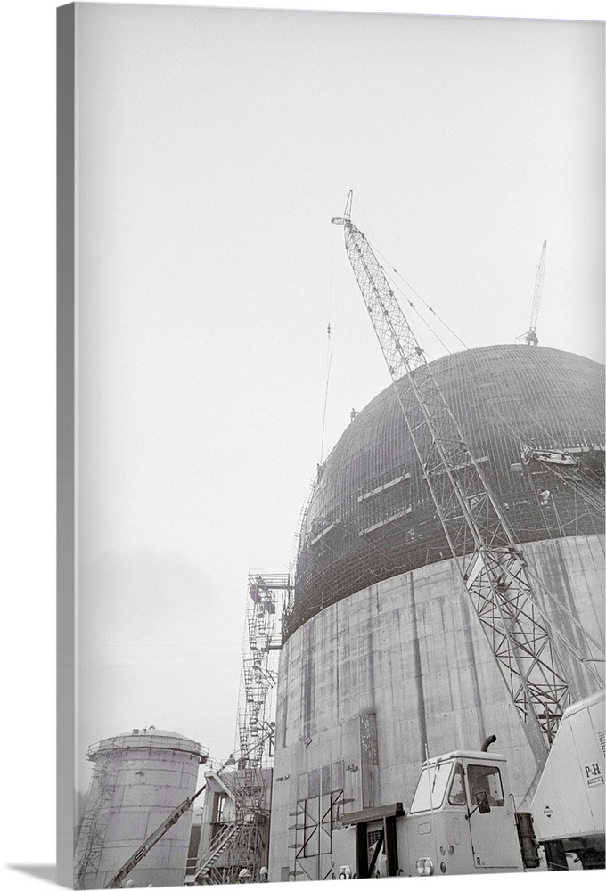 Shippingport, Pennsylvania: Workmen climb atop the concrete and steel housing for a nuclear reactor that will power Duqnes...