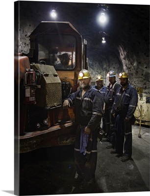 Zinc miners with a 40-ton mine truck, portrait