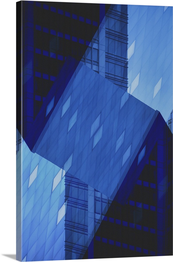 Blue abstract art of a building folded into different angles and placed all together as one.