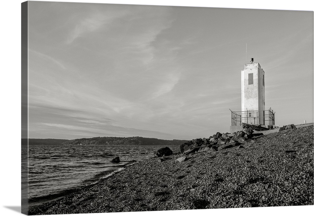 A black and white photograph of the Puget Sound and lighthouse at Browns Point, Washington.