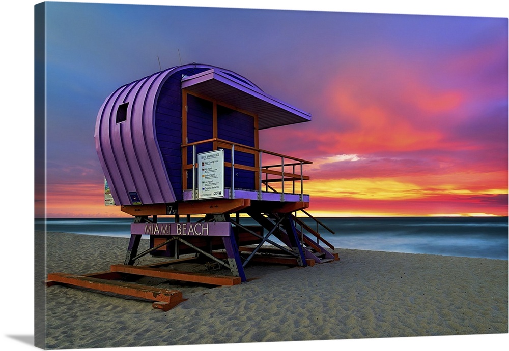 BGarish colors paint the clouds above Miami Beach's retro 17th Street lifeguard station during a spectacular sunrise.