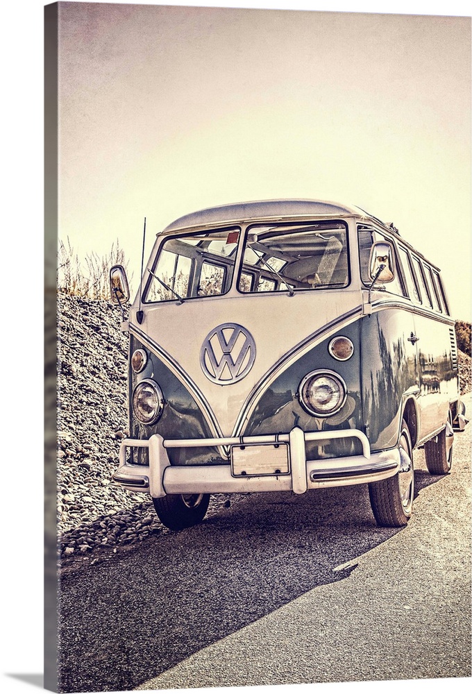 A classic old surfers vintage Volkswagen 21 window Samba Bus at the beach.