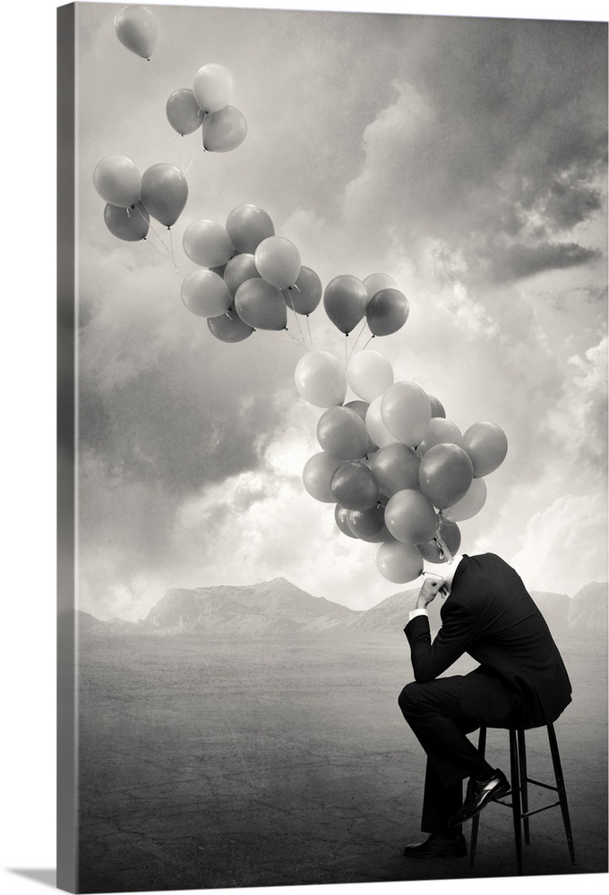 An abstract art photograph of a hollow business suit seated on a stool, with balloons hovering out of the neck.