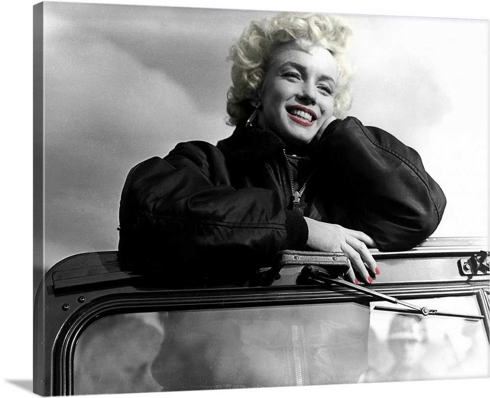 Photograph with color tint highlights of Marilyn Monroe's favorite shot from entertaining the troops during 1954 USO tour ...