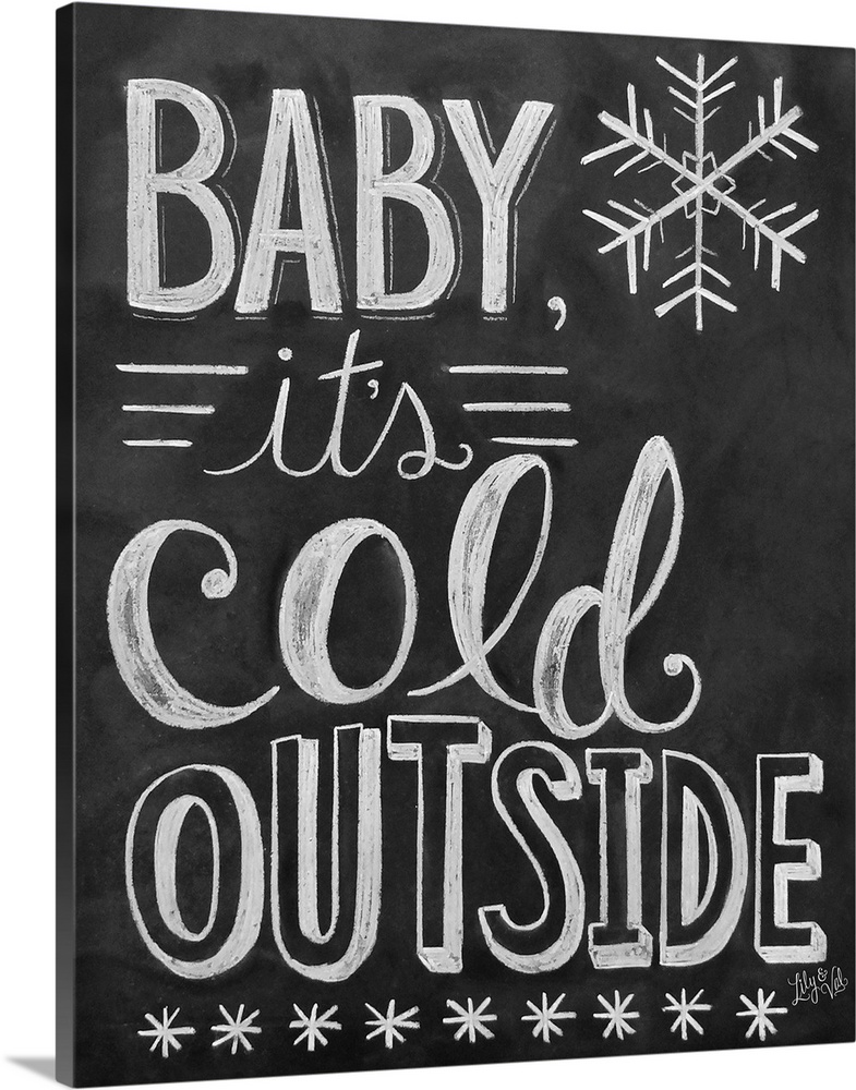 "Baby, it's cold outside" handwritten in white chalk on a black background.