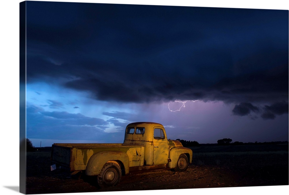 A 1951 International Harvester pickup truck at a farm near Bennet, Nebraska during a thunderstorm.