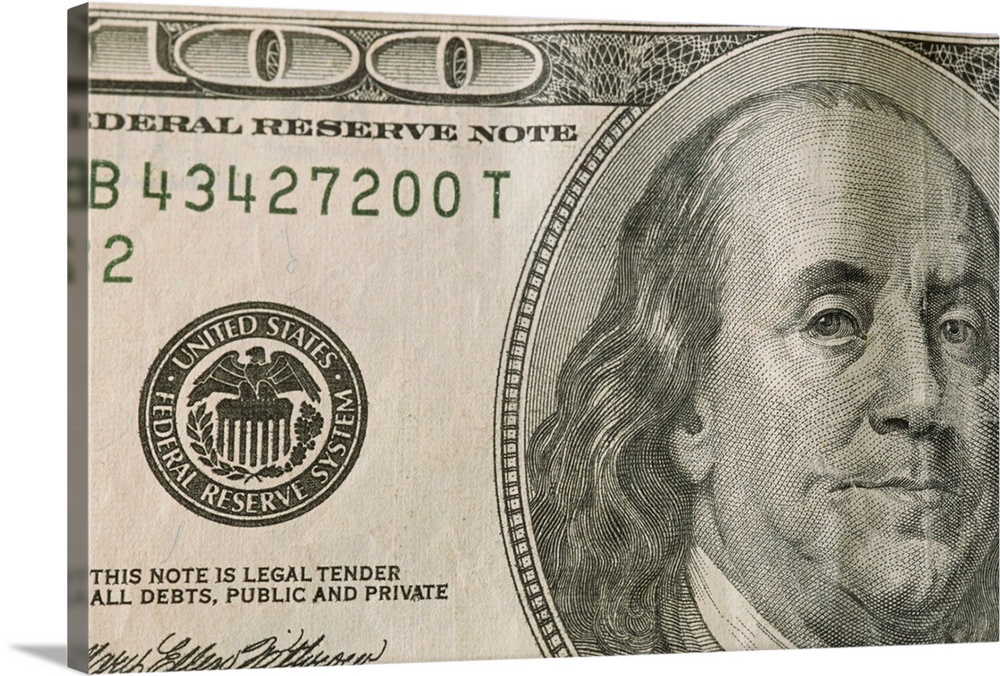 Portrait of Benjamin Franklin on the one hundred dollar bill.