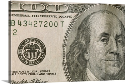 Portrait of Benjamin Franklin on the one hundred dollar bill