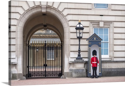 A Soldier Of The Queen's Foot Guard On Duty Outside Buckingham Palace, London, England