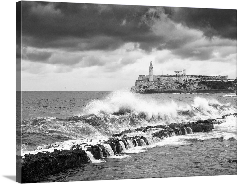 A stormy sea along the Malecon, Cuba, Havana, Castillo del Morro (Castillo de los Tres Reyes del Morro).