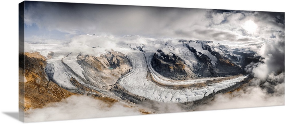 Aerial panoramic of Gorner Glacier (Gornergletscher) covered by clouds, Zermatt, canton of Valais, Switzerland.