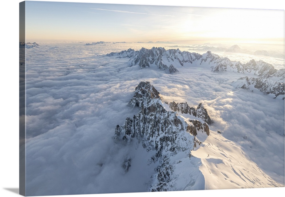 Aerial view of snowy peaks of Mont Blanc during sunrise, Courmayeur, Aosta Valley, Italy, Europe. Valle d'Aosta, Western E...