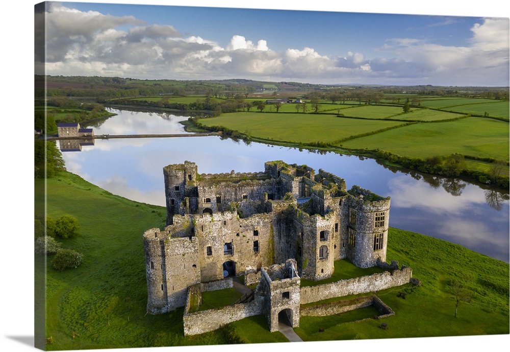 Aerial vista of Carew Castle in Pembrokeshire Coast National Park, Wales, UK. Spring (May) 2021.