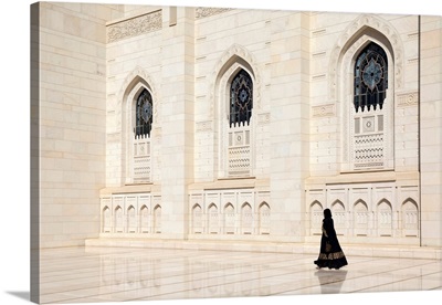 An Omani Woman Walks Past The Marble Facade Of Sultan Qaboos Grand Mosque, Muscat, Oman