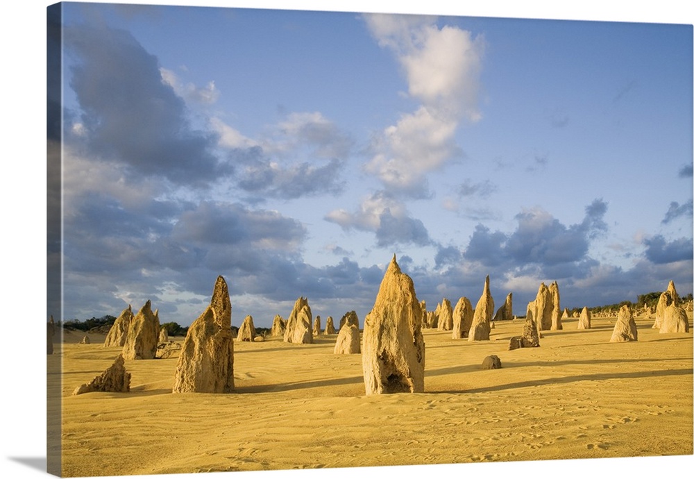 Australia, Western Australia, Cervantes, Nambung National Park. Limestone pillars at dusk in the Pinnacles Desert.