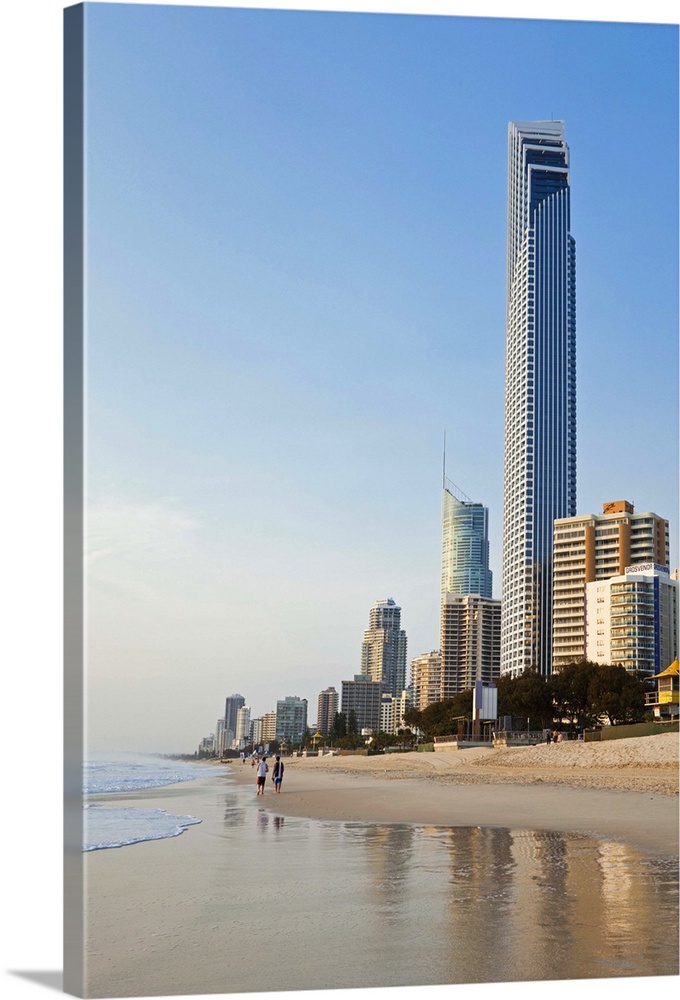 Australia, Queensland, Gold Coast, Surfers Paradise. View of beach and Surfers Paradise skyline at dawn.