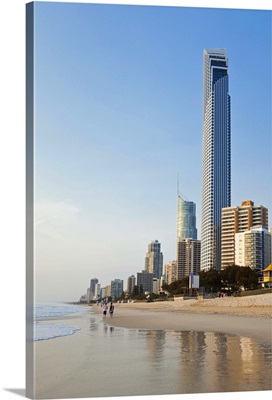 Australia, Queensland, Gold Coast, View of beach and Surfers Paradise skyline at dawn
