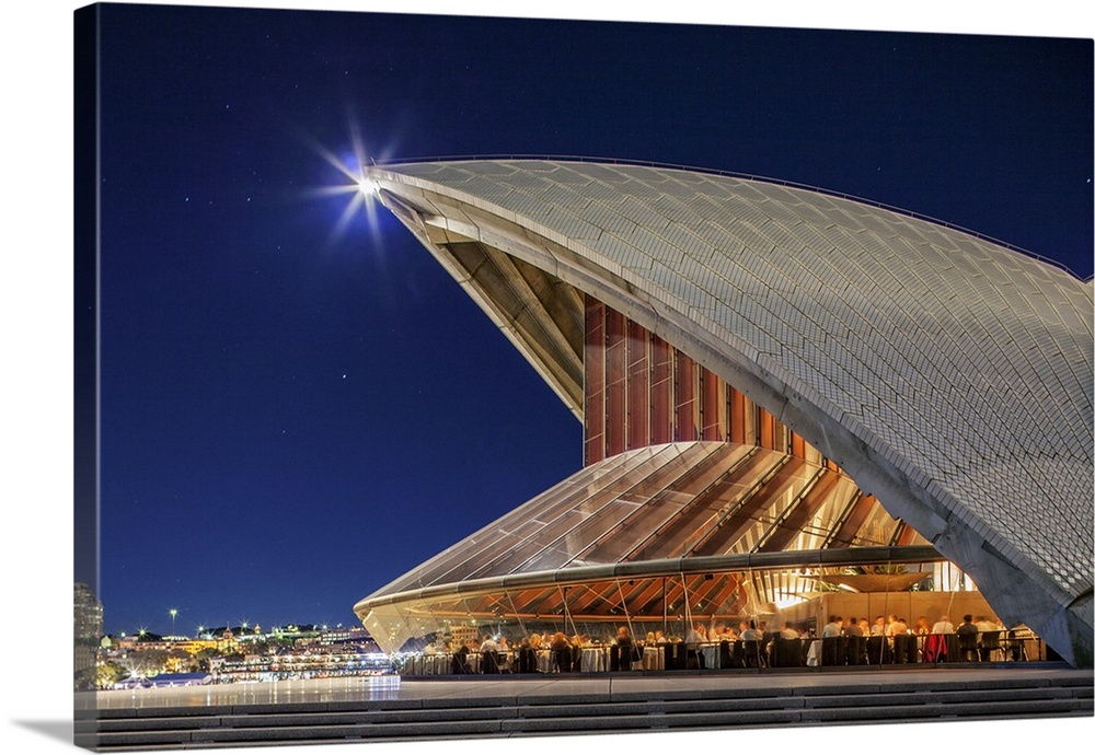 Australia, New South Wales, Sydney, Kirribilli, The Rocks, Bennelong, Restaurant and Sydney Opera House by night.