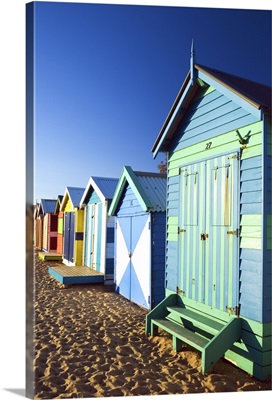 Australia, Victoria, Melbourne, Colourful beach huts at Brighton Beach