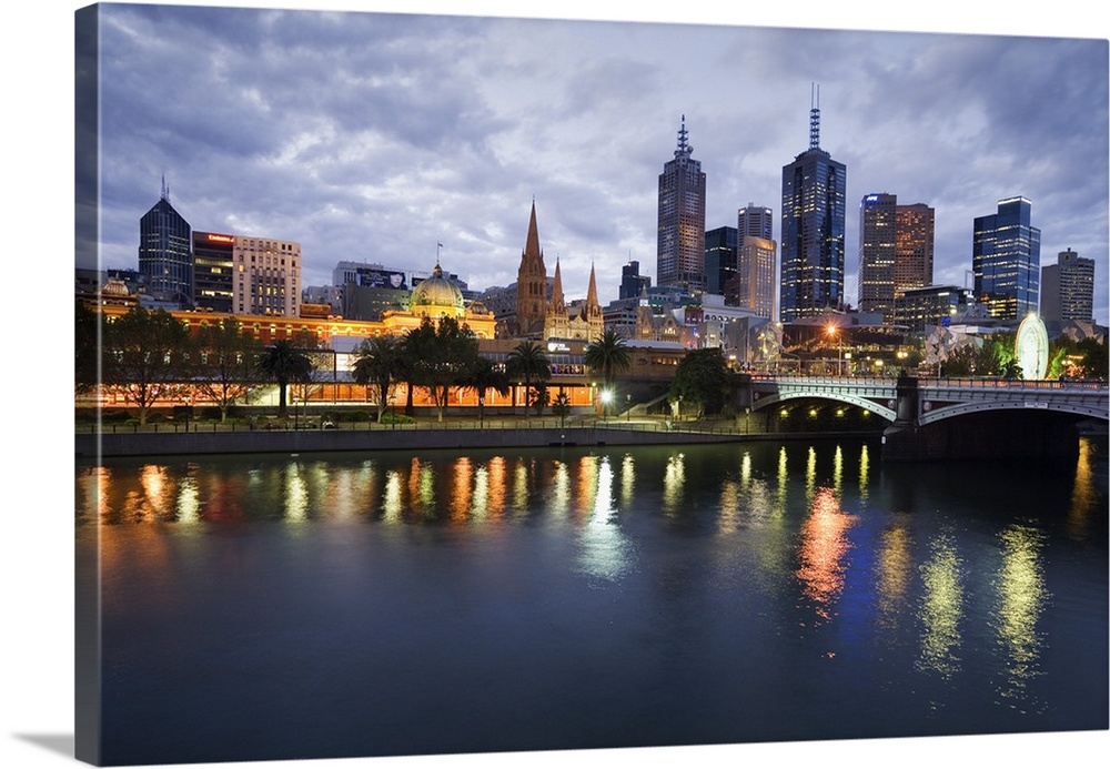 Australia, Victoria, Melbourne. Yarra River and city skyline by night.