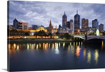 Australia, Victoria, Melbourne, Yarra River and city skyline by night