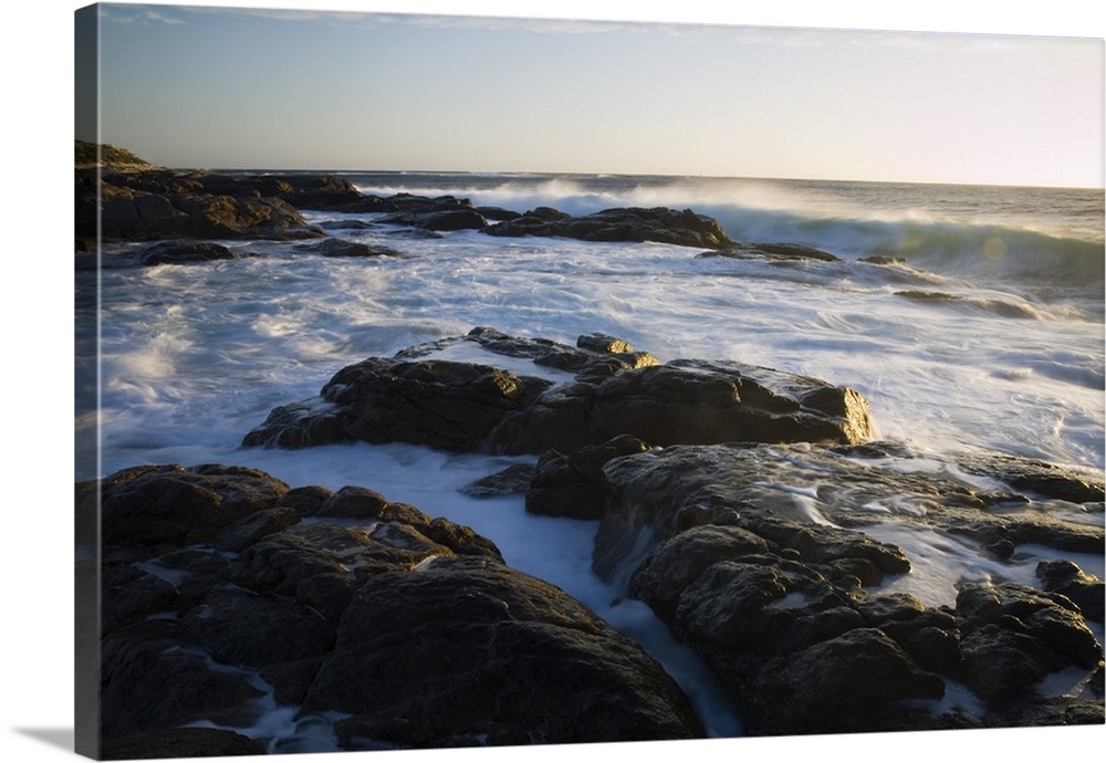 Australia, Western Australia, Leeuwin-Naturaliste National Park, Margaret River. Waves crash on the rugged coastline at th...