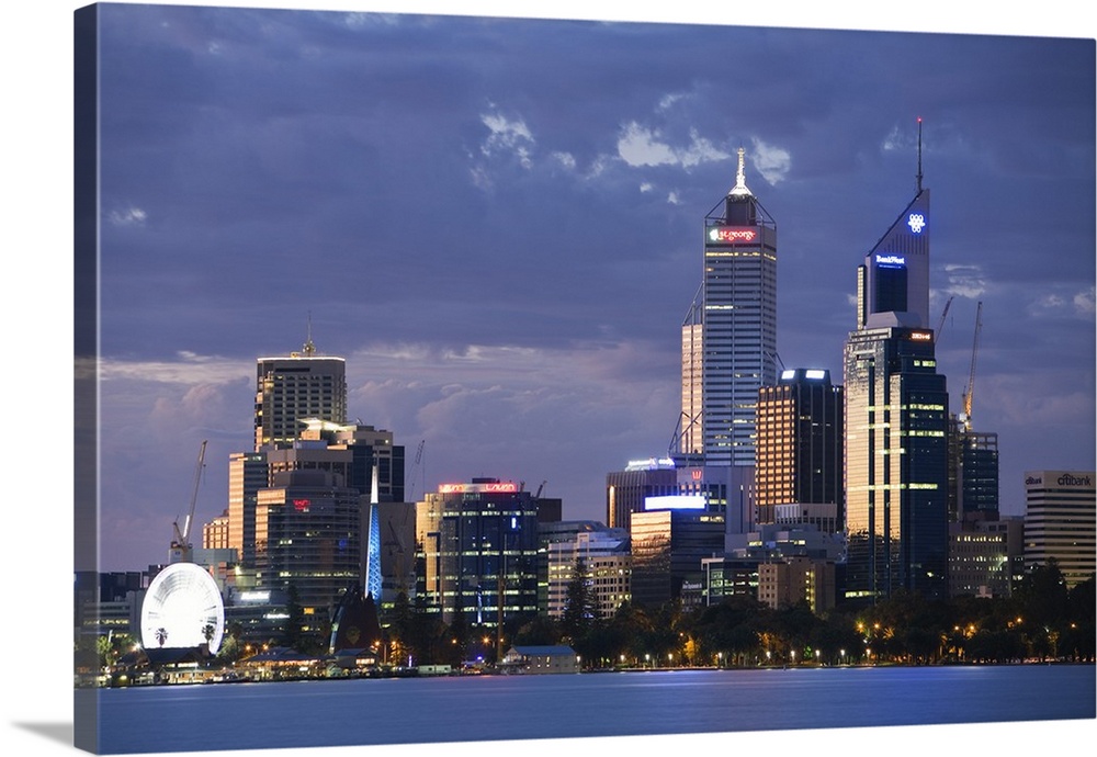 Australia, Western Australia, Perth. The Swan River and city skyline at dusk.