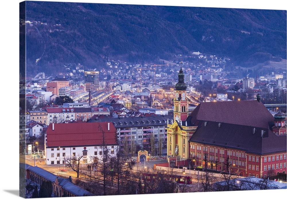 Austria, Tyrol,  Innsbruck, elevated view of the Wilten Abbey Church, dawn, winter