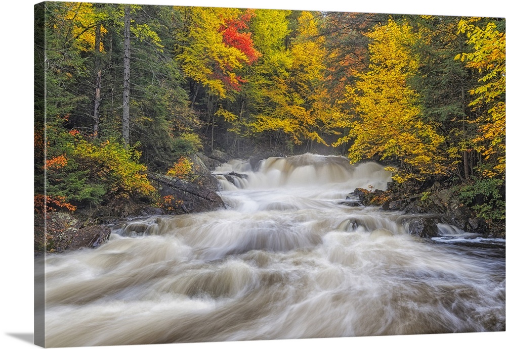 Autumn colour at Brooks Falls on the Magnetawan River in the Almaguin Highlands, Emsdale, Ontario, Canada