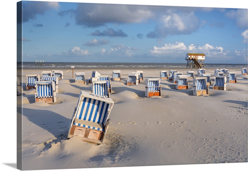 Beach chairs and Stilt house at beach, Sankt Peter-Ording, North Sea, North Frisia, National Park Wadden Sea, Schleswig-Ho...