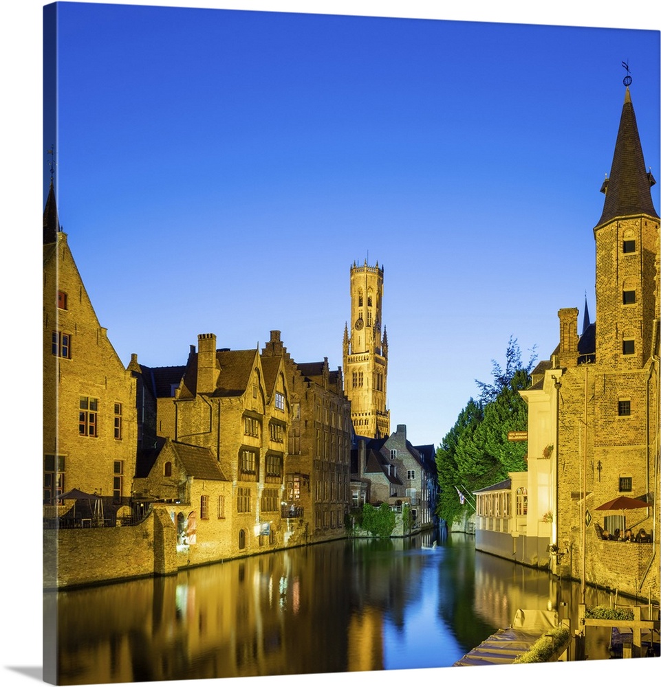 Belgium, West Flanders (Vlaanderen), Bruges (Brugge). Belfort van Brugge and medieval buildings on the Dijver canal from R...
