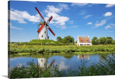Belgium, West Flanders, Damme. Hoeke Mill windmill on the Damse Vaart canal