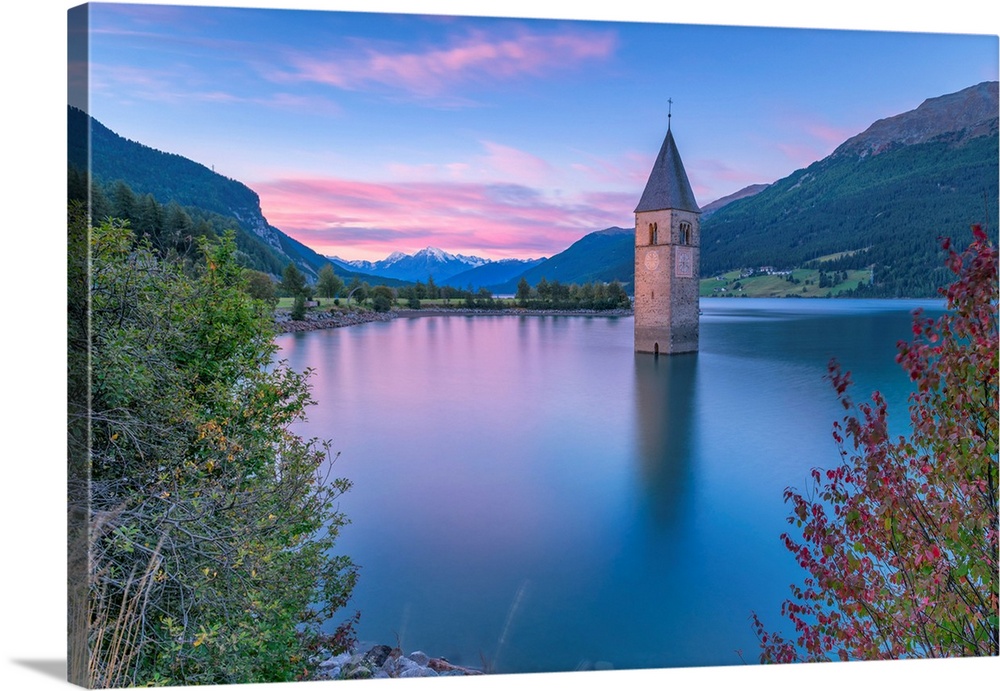 Bell tower submerged of Resia lake at sunrise-Europe, Italy, Trentino Alto Adige, South Tyrol, Curon Venosta.