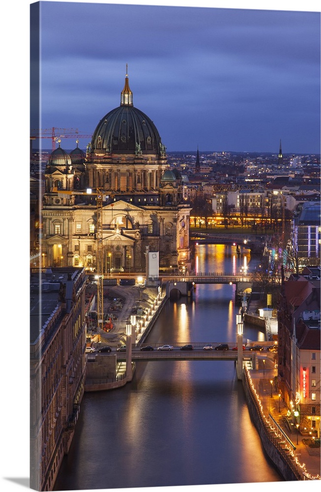 Berlin Cathedral, Berliner Dom, seen fom the Fischerinsel at dusk, the river Spree in the foreground.